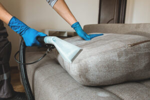 Upholstery cleaning tool in action